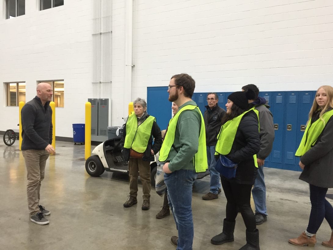 ERC trainees smiling on a process tour.